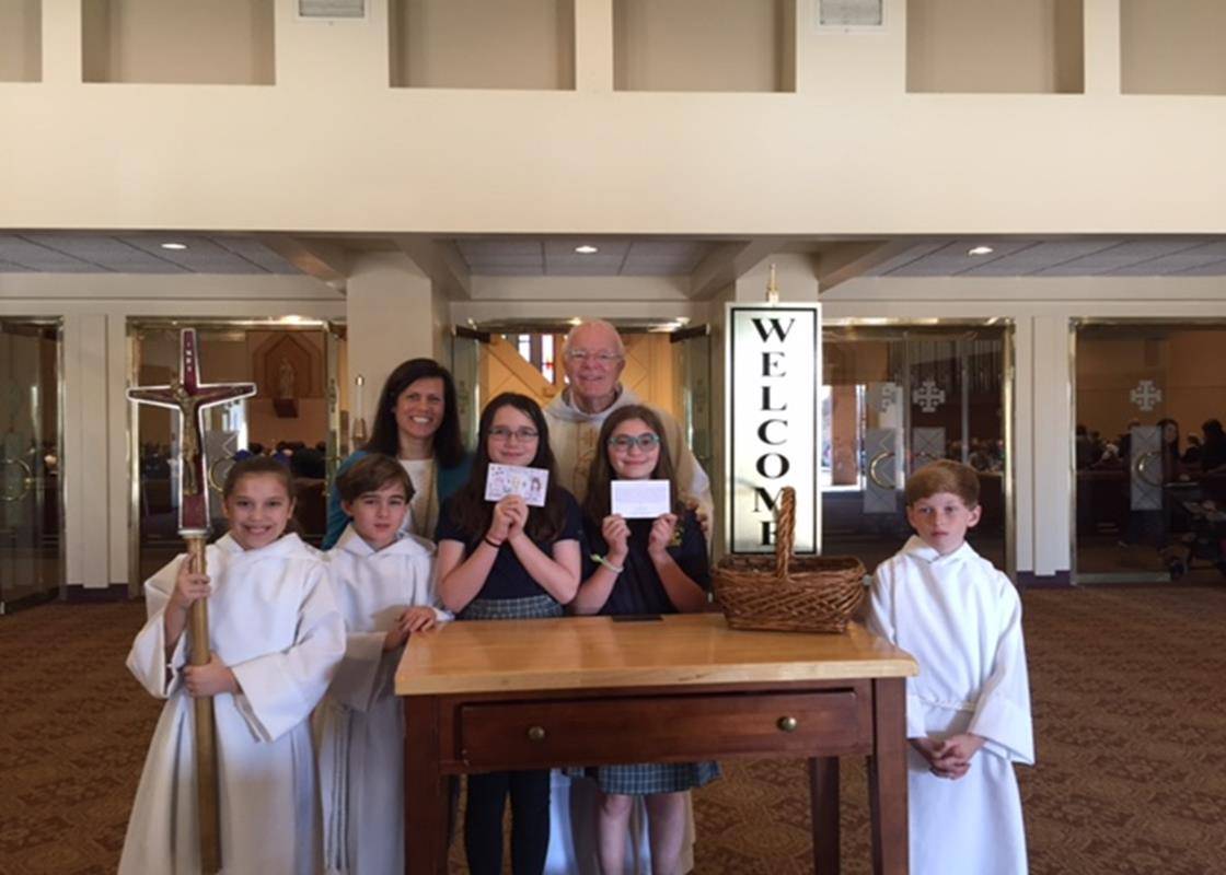 The student winners of St. Gabriel Prayer Card winners are fifth graders Rory Howes wrote the prayer and fifth grader Noelle Rogers drew the picture. (Photos provided by Michele Snoke) 