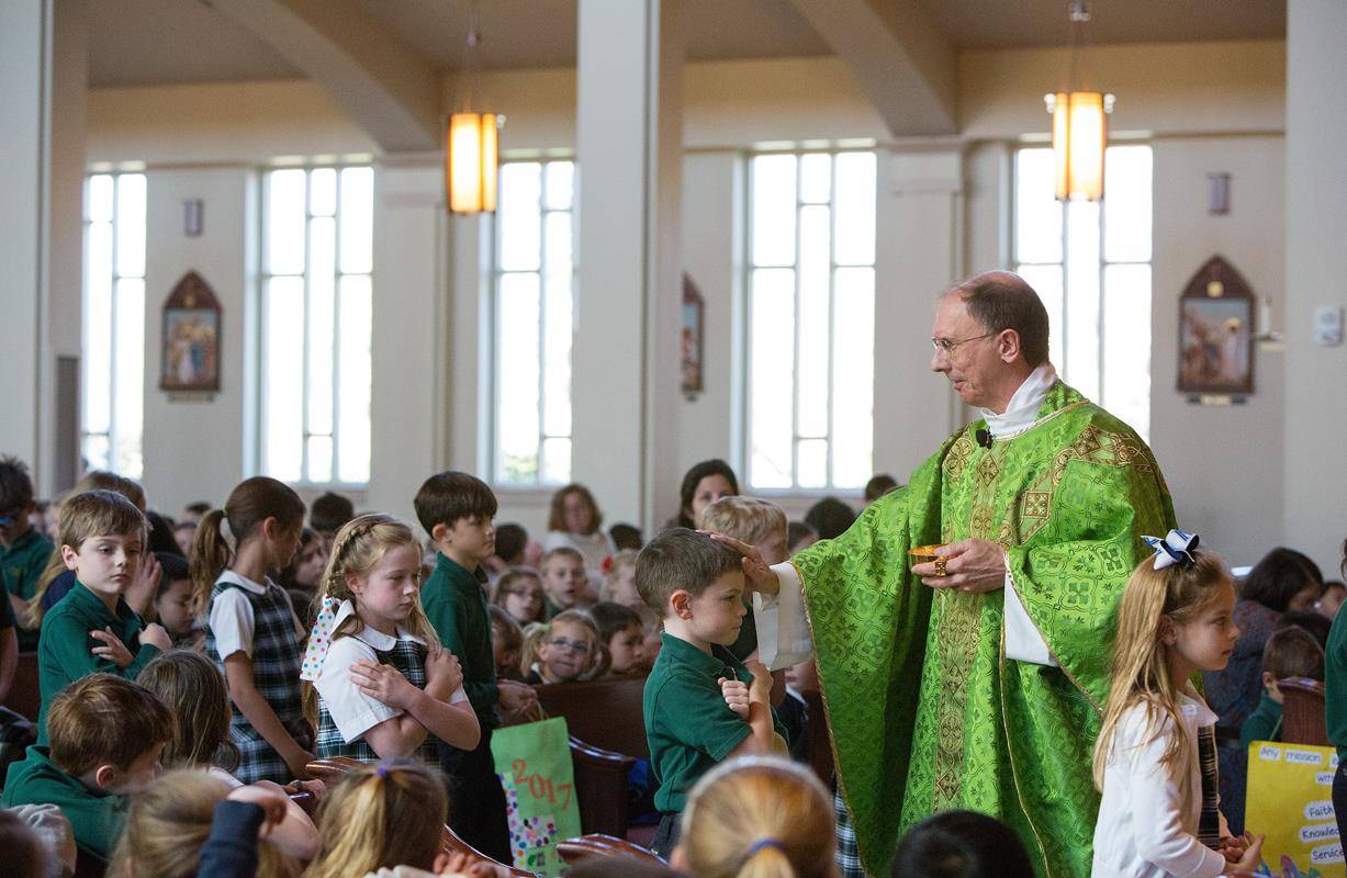St. Mark students in Huntersville kicked off Catholic Schools Week with a Mass with Bishop Peter Jugis. (Photos by Jeannie DeSena) 
