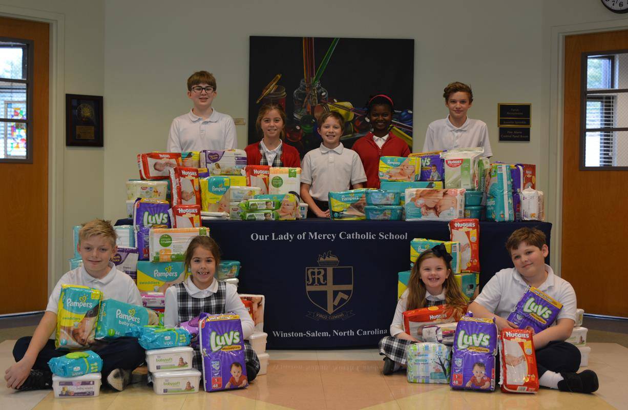 Our Lady of Mercy held a diaper and wipes drive for Birthright. Birthright is a local, Pro-life organization established to help mothers to-be through their pregnancies and births. They have recently lost the support of the NC Diaper Bank, and unfortunate