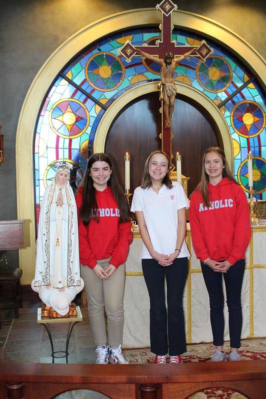 Mary’s Court at Charlotte Catholic High School, from left: Julianna Taylor, Ella Bowman, and Ella Lengers. (Provided photo)