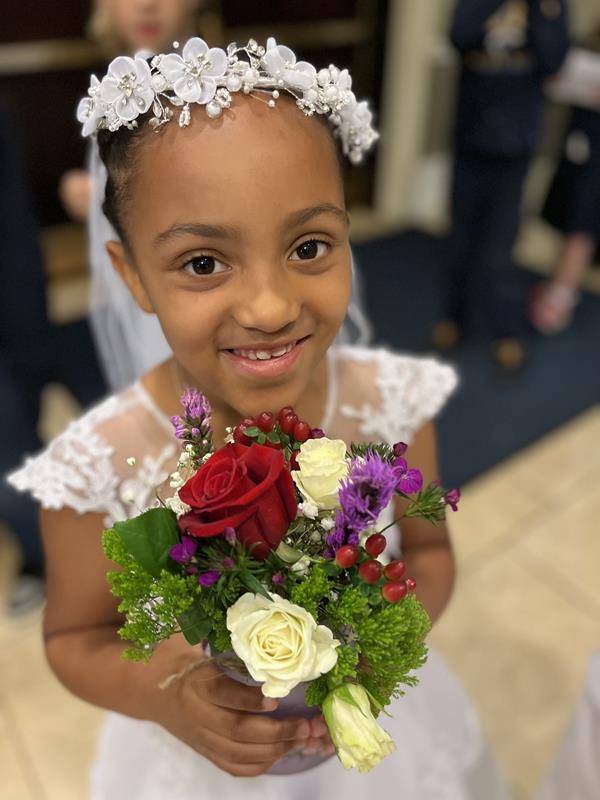 Second grade students at Sacred Heart School in Salisbury lead the all-school Mass and also adorned our Mother, Mary with flowers. (Provided photos) 