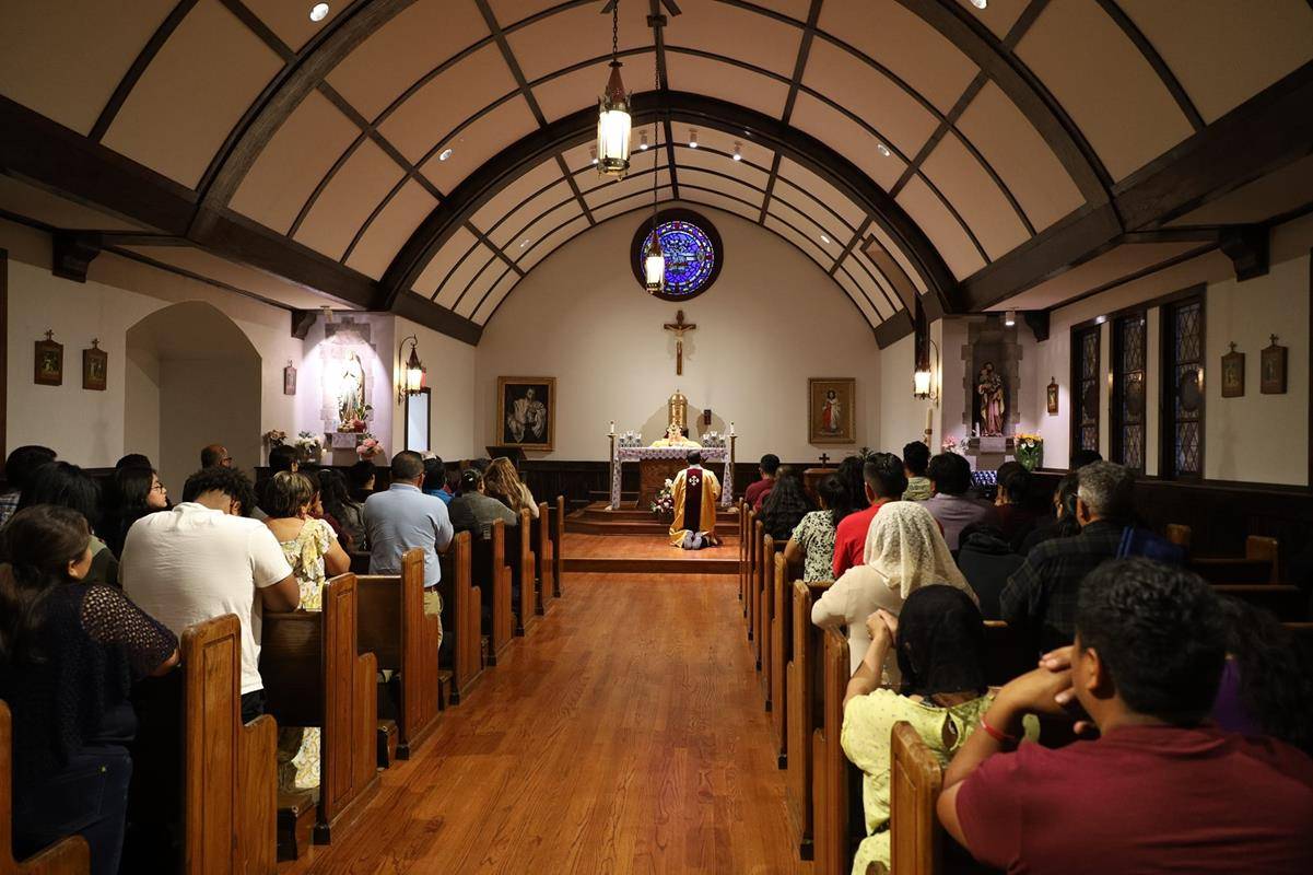 Eucharist Procession around Our Lady of Lourdes in Monroe as part of the Eucharistic Triduum 2023. Father Benjamin Roberts, pastor, was leading.