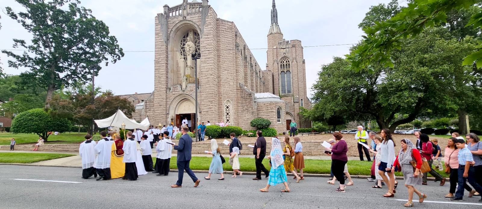 Our Lady of Grace Church in Greensboro held a Corpus Christi procession led by Father Casey Coleman, pastor. The procession was just over a mile long and included First Communicants and traditional chants from the Latin Mass choir. Photo: Kelly Henson