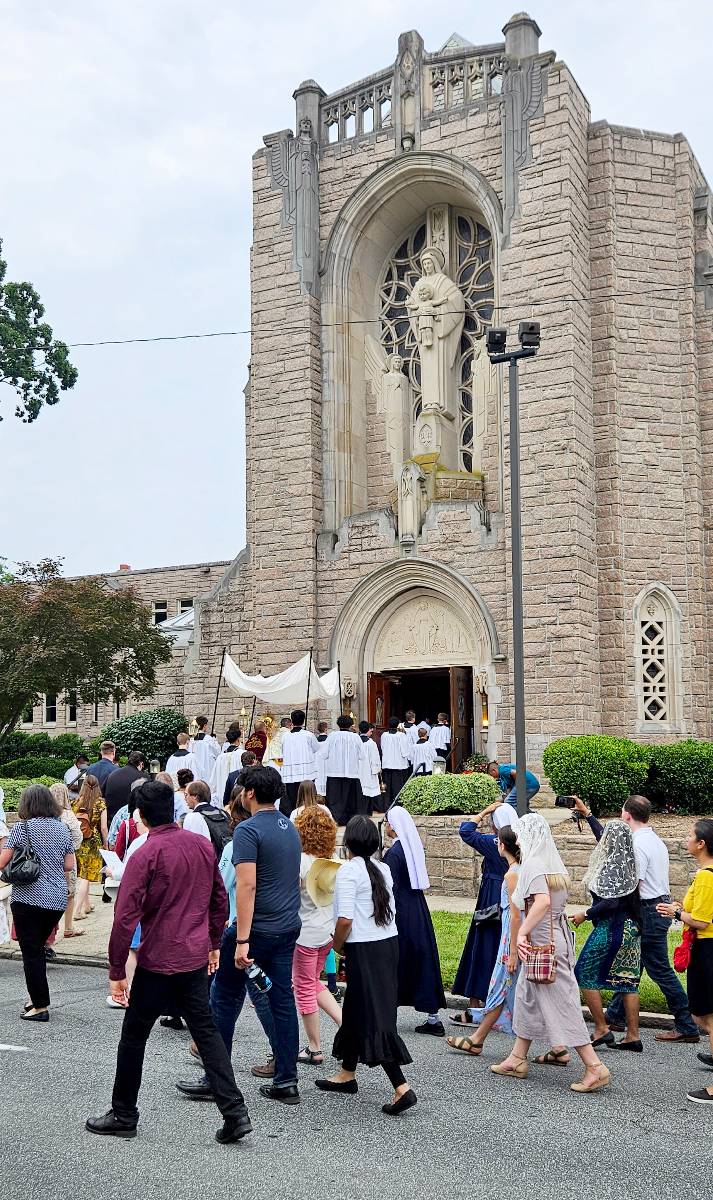 Our Lady of Grace Church in Greensboro held a Corpus Christi procession led by Father Casey Coleman, pastor. The procession was just over a mile long and included First Communicants and traditional chants from the Latin Mass choir. Photo: Kelly Henson