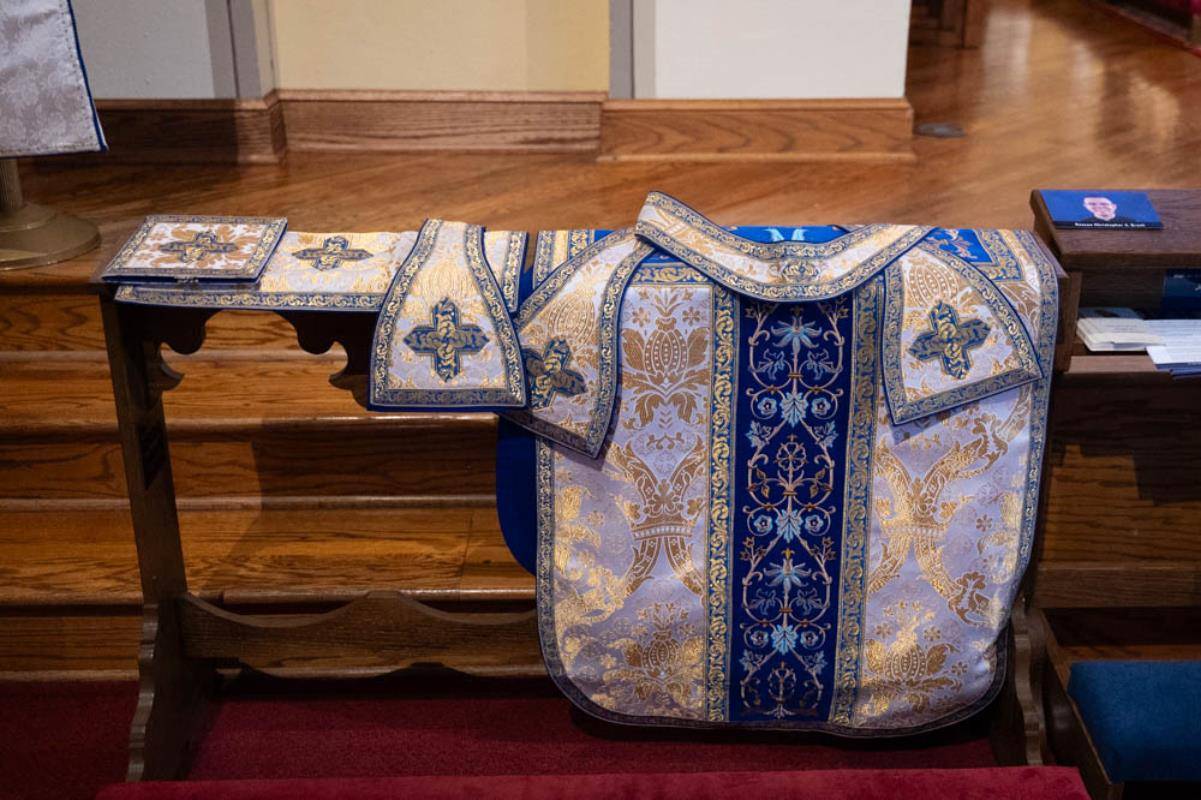 Christopher Brock’s vestments are primarily gold in color, in celebration of the joyful occasion of his ordination. Blue accents honor the feast of the Immaculate Heart of Mary, which is observed on his ordination day.