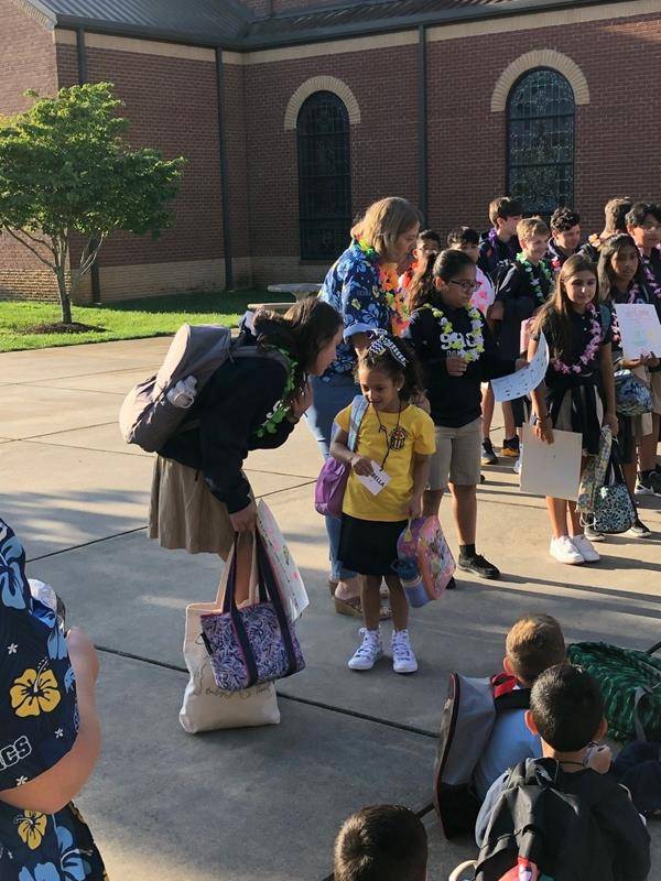 Students return to Sacred Heart School.