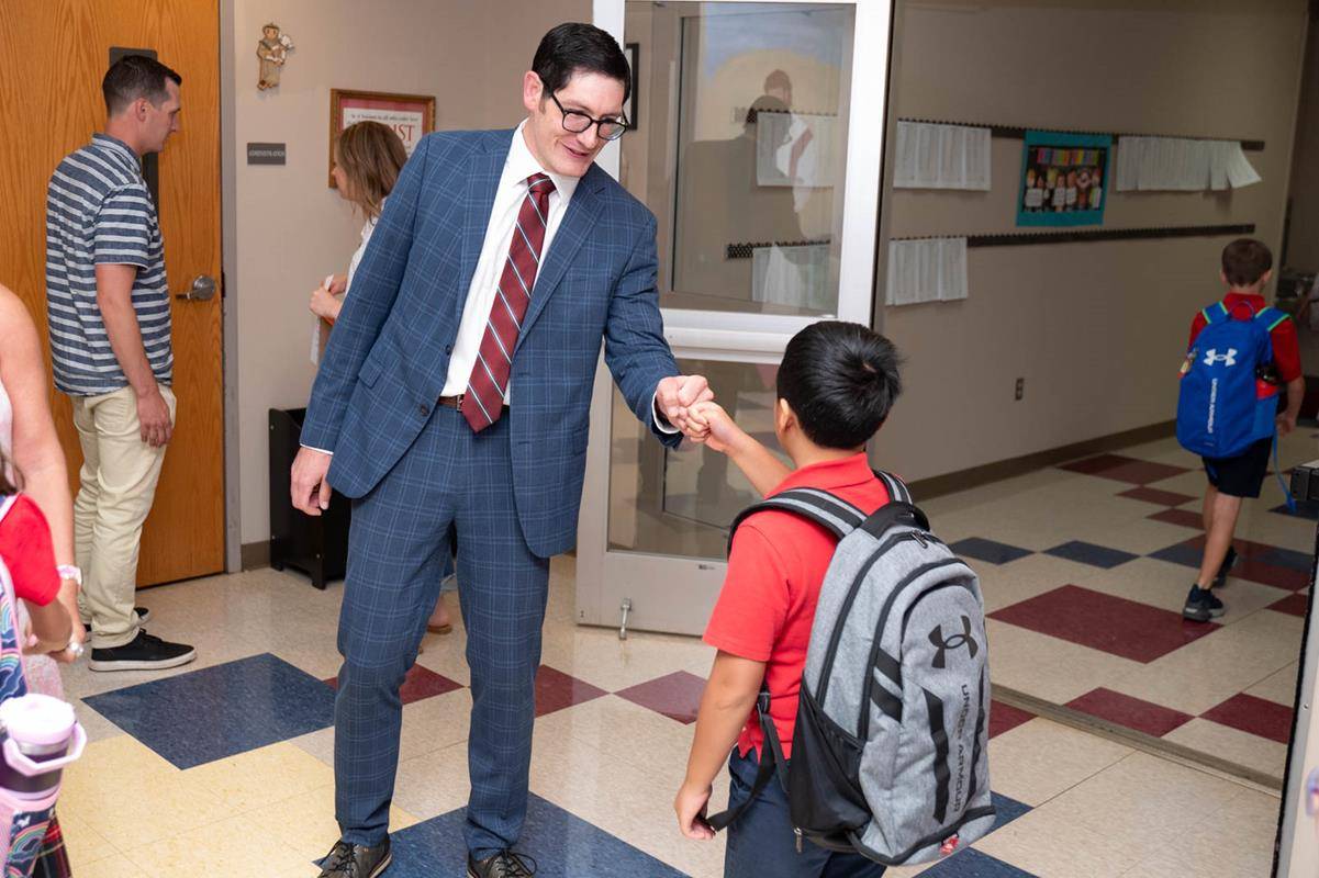Students start the new year at St. Matthew School. Superintendent Dr. Greg Monroe is on campus for the first day of school. 
