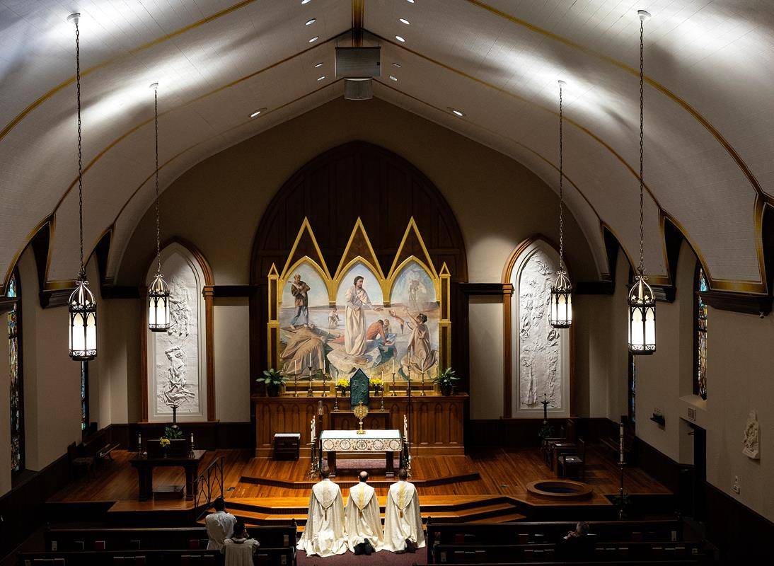 Faithful celebrate Jesus in the Eucharist in joyous procession