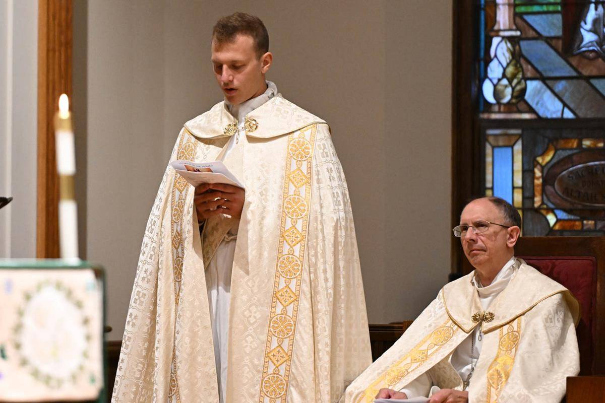 Faithful celebrate Jesus in the Eucharist in joyous procession