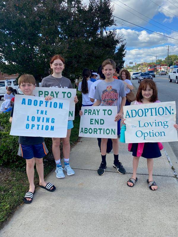 Faithful gathered along Battleground Avenue in Greensboro on Oct. 1 to pray for life. (Photos provided by David Foppe)