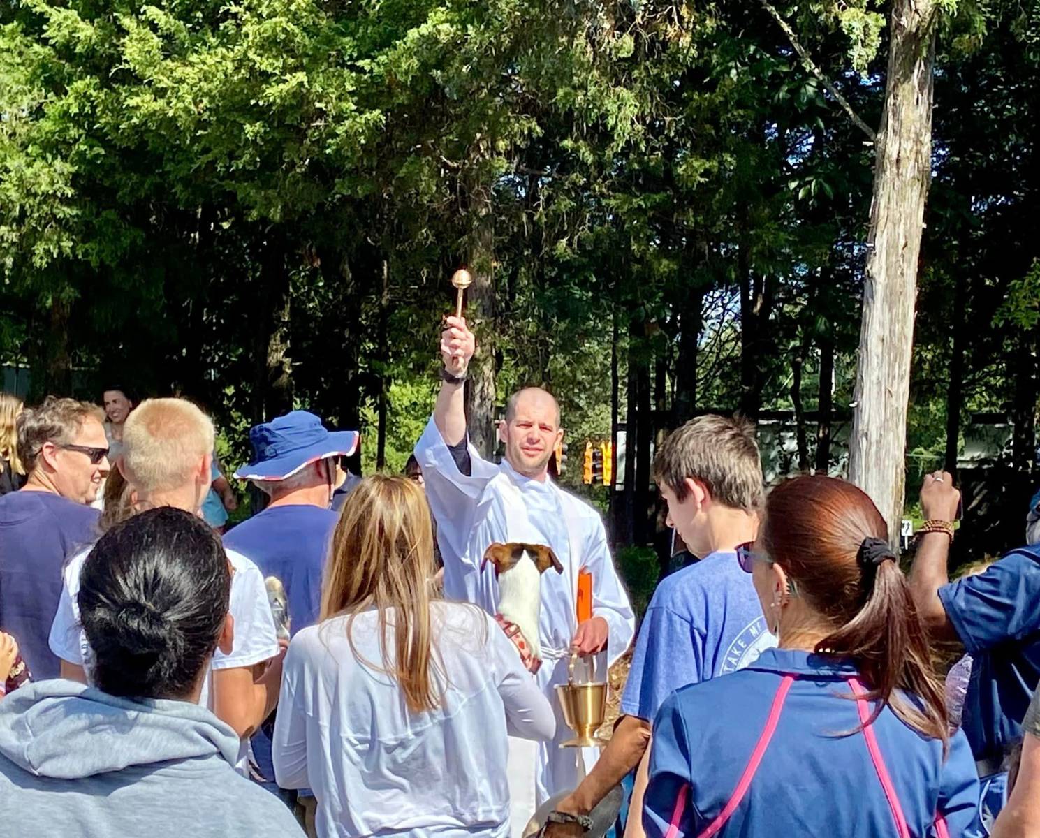 St. Matthew Parish's Father Darren Balkey spent the afternoon making sure every pet received a blessing.