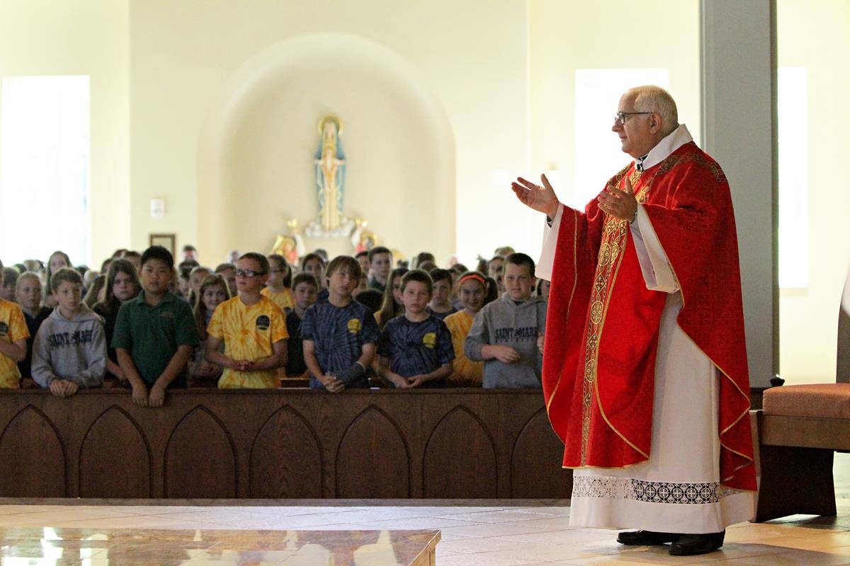 Msgr. Bellow celebrated Masses regularly for St. Mark students at St. Mark Church, and he visited the school often - even after retirement 