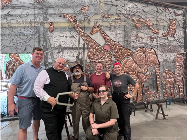 Joe Brady, Monsignor Marcaccio, Jim Gallucci and his team