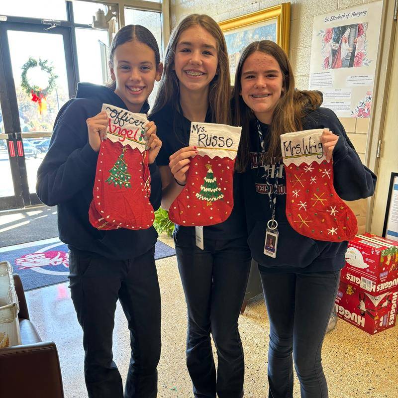 Holy Trinity Middle School celebrated St. Nicholas Day. Good ole' St. Nick visited our classroom and his helpers, Student Council members, delivered stockings to each classroom. 