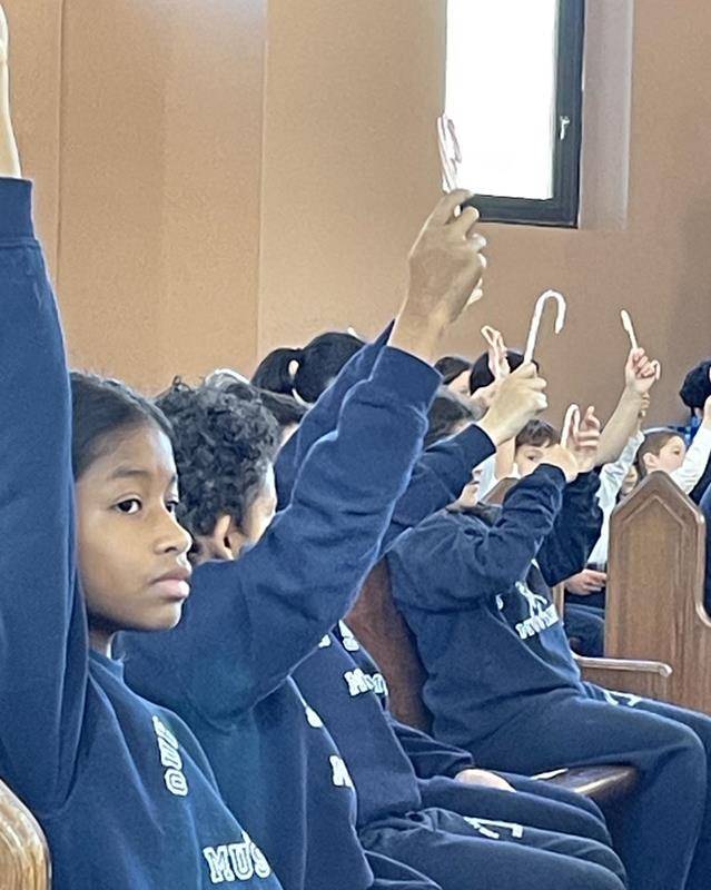 Students at Our Lady of Mercy in Winston-Salem celebrated the Feast of St. Nicholas by having their candy canes blessed.