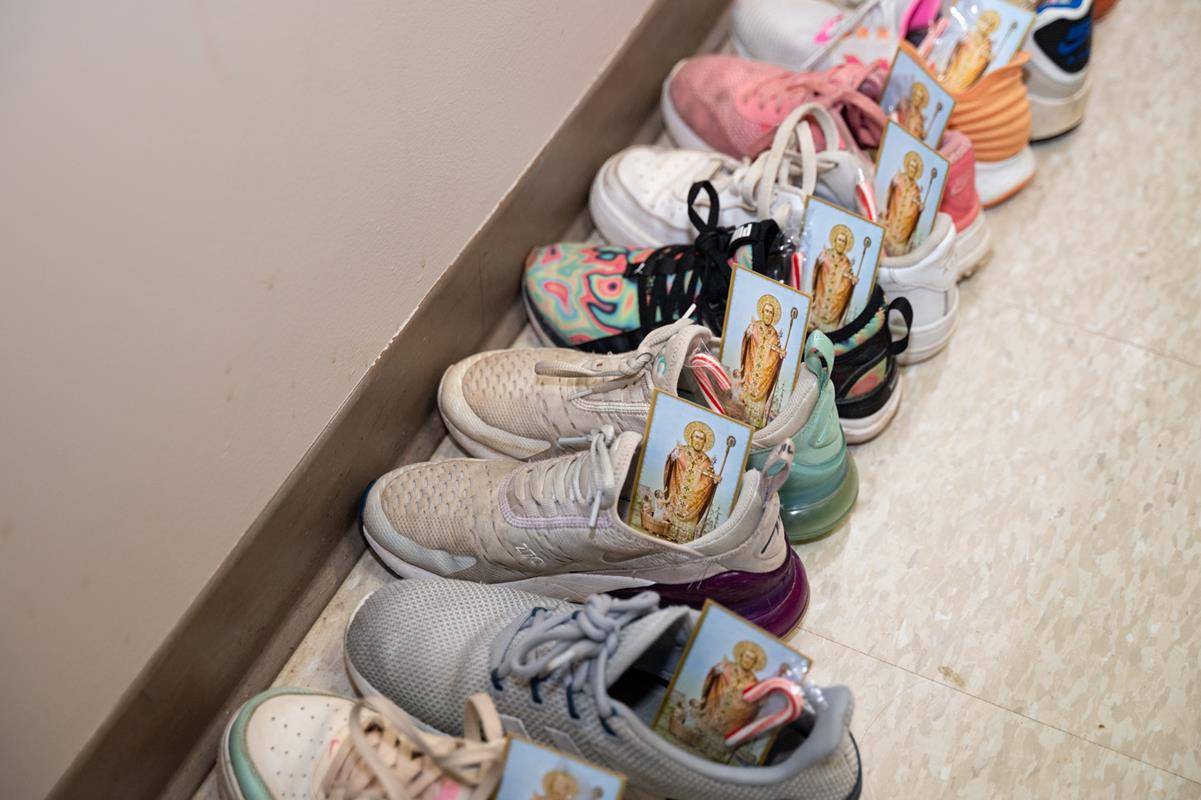 At St. Matthew School in Charlotte, students placed their shoes in the hallway and they were filled with treats by St. Nicholas, who also visited with the children, teaching them about the true story of his life.