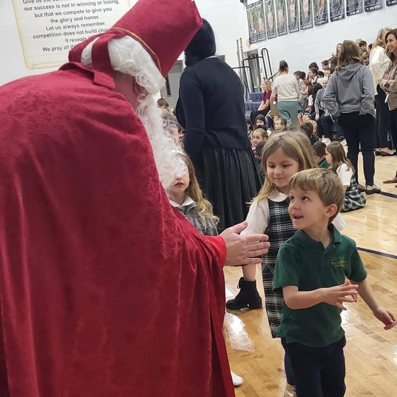 St. Nicholas took time out of his feast day to visit our kindergarten through 4th grade at St. Mark School. 