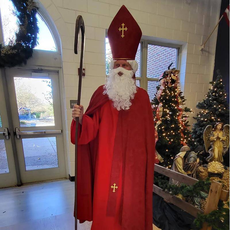 St. Nicholas took time out of his feast day to visit our kindergarten through 4th grade at St. Mark School. 