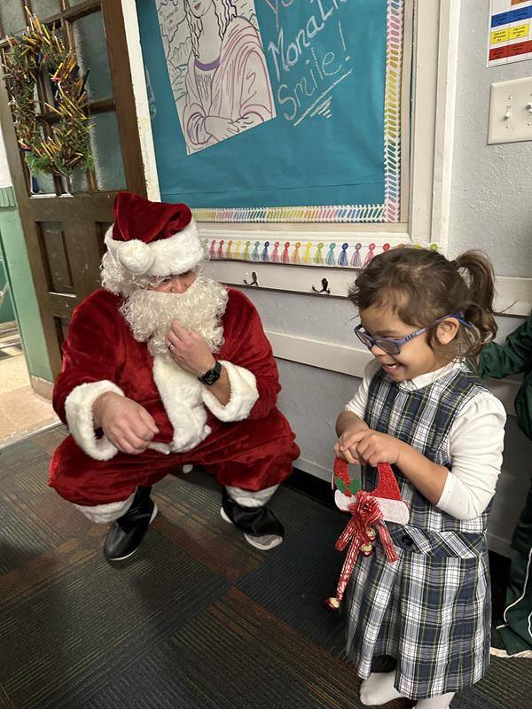 St. Nicholas came to St. Patrick School in Charlotte to leave treats for the students. 