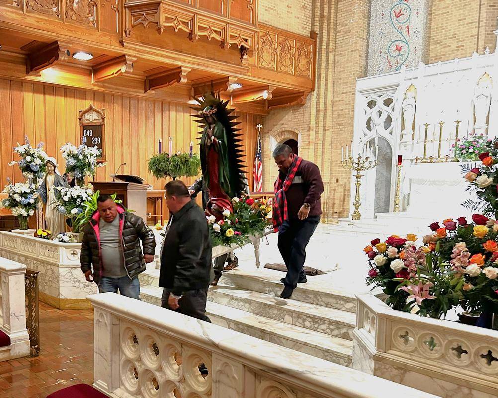 Our Lady of Grace Church in Greensboro held a procession and Mass followed by mariachi music, Mexican hot chocolate and pastries in the courtyard.