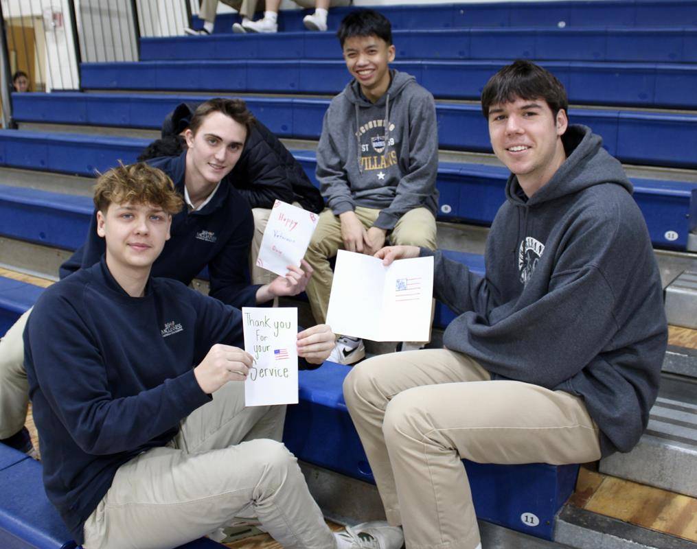 Bishop McGuinness students also wrote cards to service members.