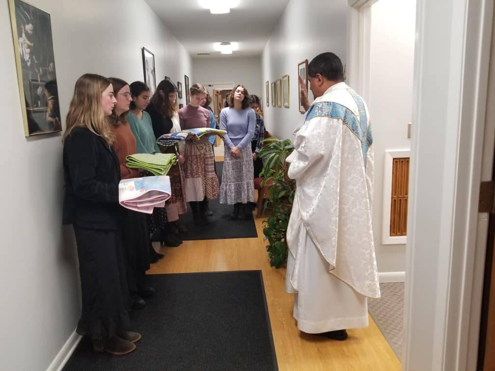 For community service day, students at Canongate Catholic High School donated items to Open Arms Pregnancy Center in Hendersonville, including diapers, wipes and handmade baby quilts.