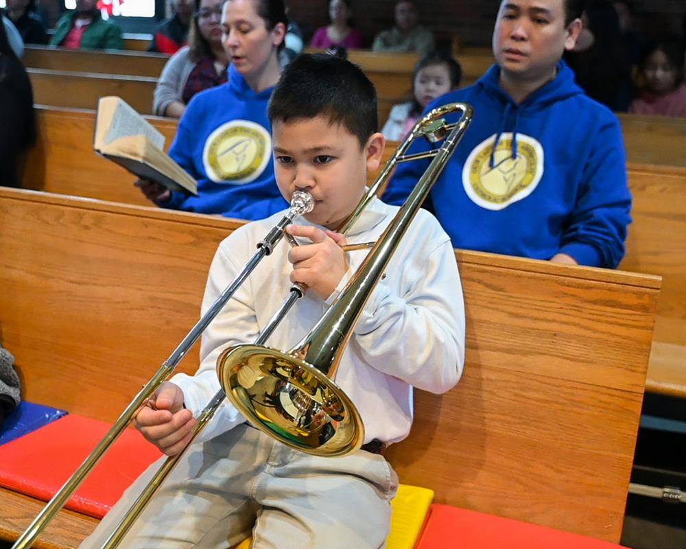 The school’s band accompanied the parish’s choir and provide music throughout the liturgy. 