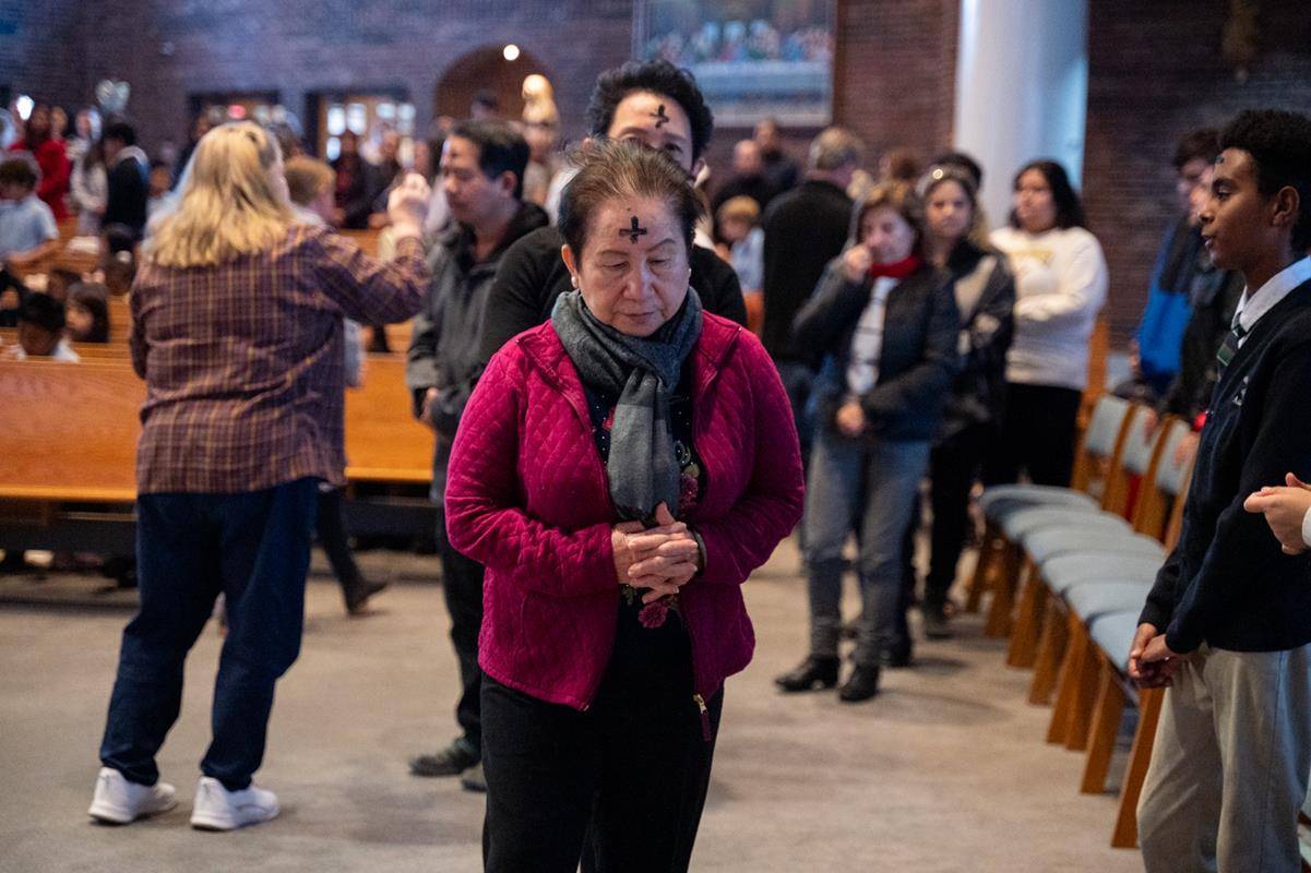Father Victor Ameh, a priest of the Missionary Society of St. Paul of Nigeria, newly assigned to Our Lady of the Assumption in Charlotte celebrated Ash Wednesday Mass with students from Our Lady of the Assumption School. 