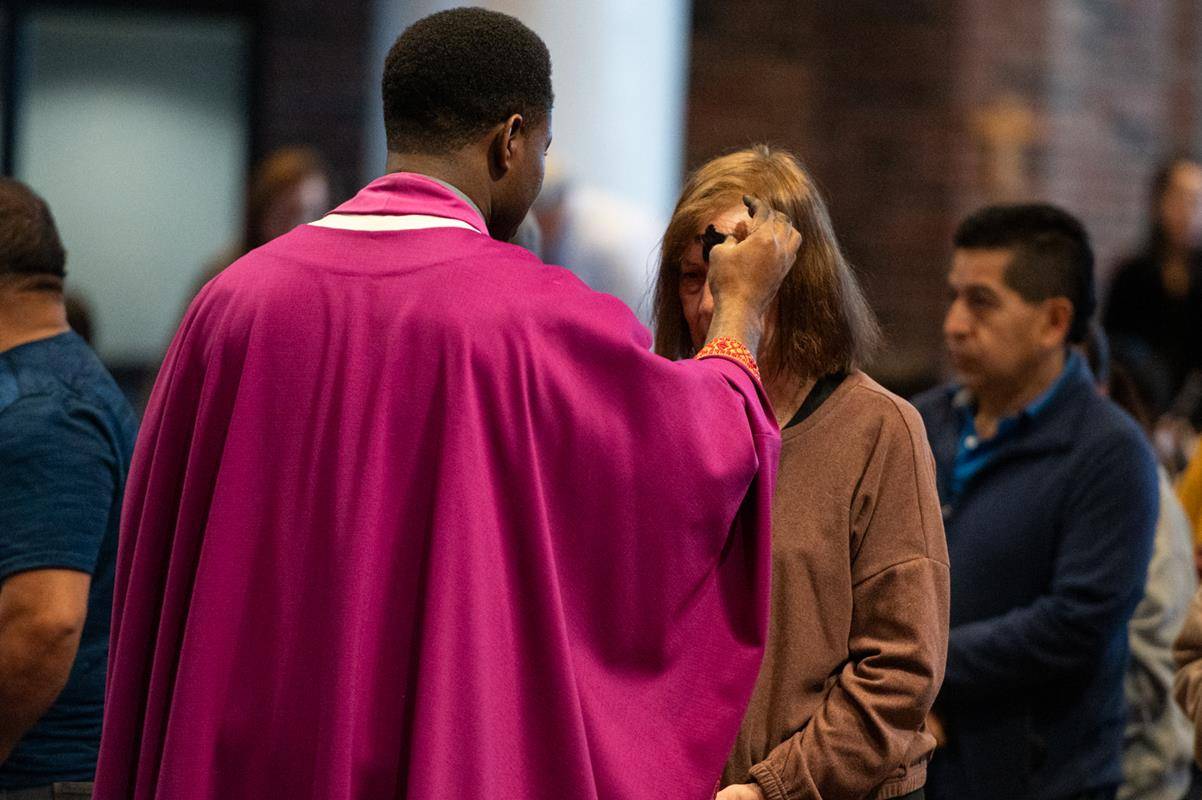 Father Victor Ameh, a priest of the Missionary Society of St. Paul of Nigeria, newly assigned to Our Lady of the Assumption in Charlotte celebrated Ash Wednesday Mass with students from Our Lady of the Assumption School. 