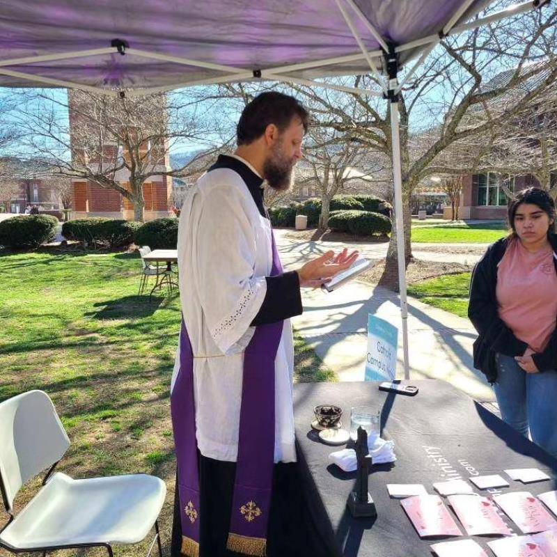 Western Carolina University Catholic Campus Ministry our Ash Wednesday liturgies on the lawn yesterday afternoon at the A.K. Hinds University Center.