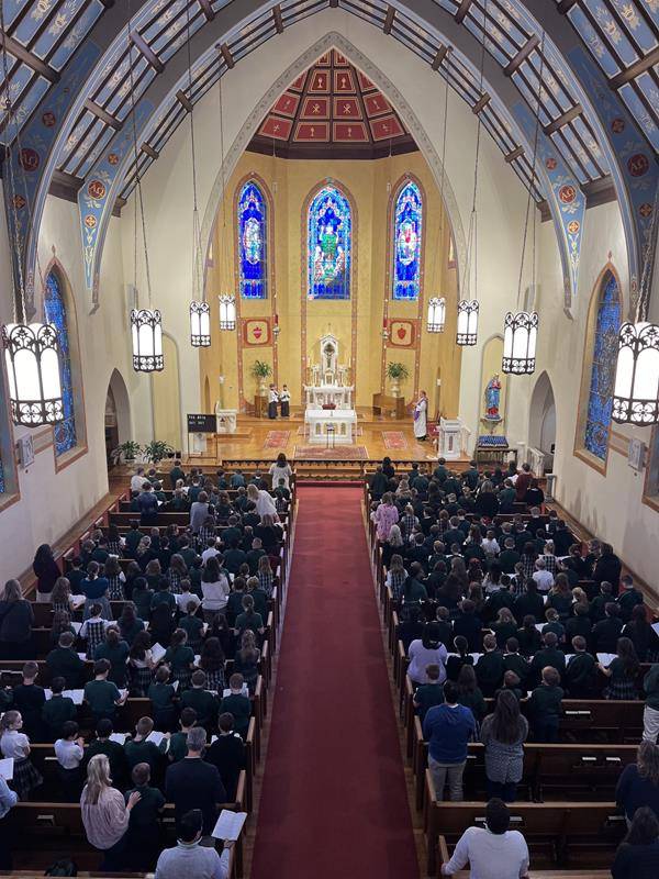 Students attend Mass on Ash Wednesday at St. Patrick Cathedral in Charlotte. 