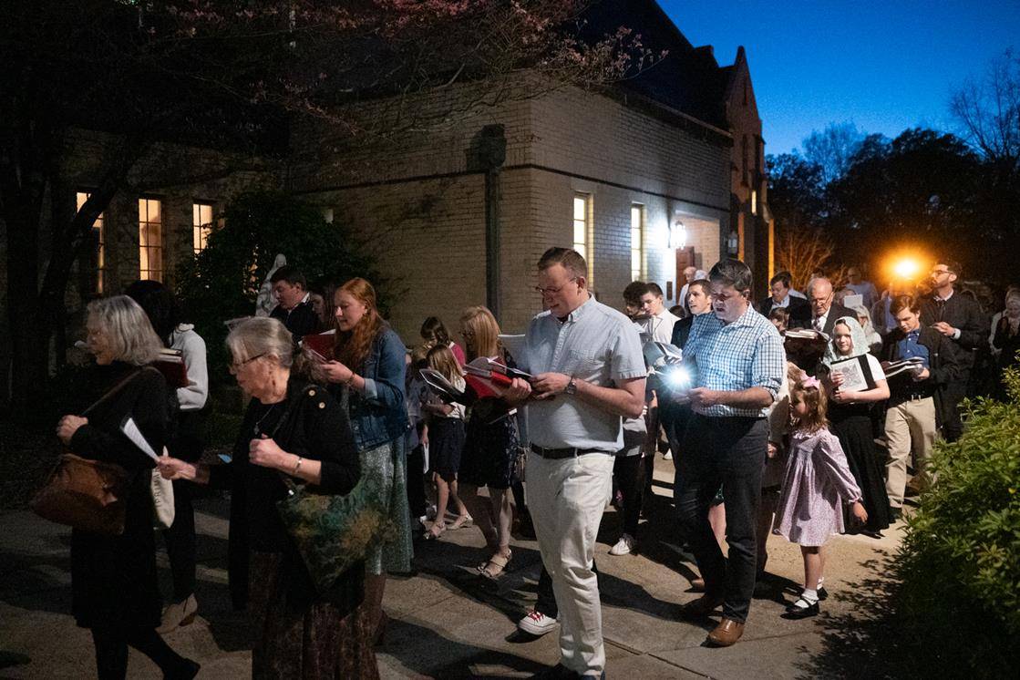The congregation at St. Patrick Cathedral processes to the altar of repose.