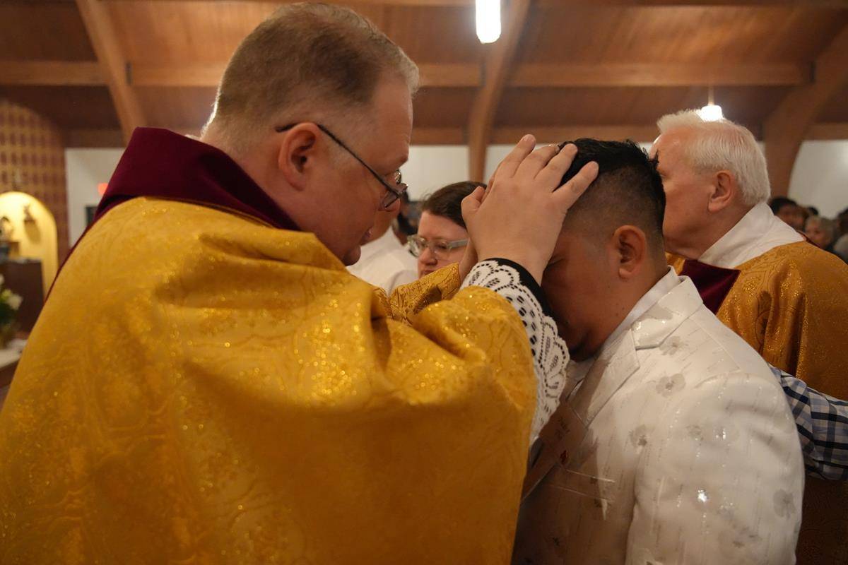 Easter Vigil at Our Lady of Lourdes in Monroe.
