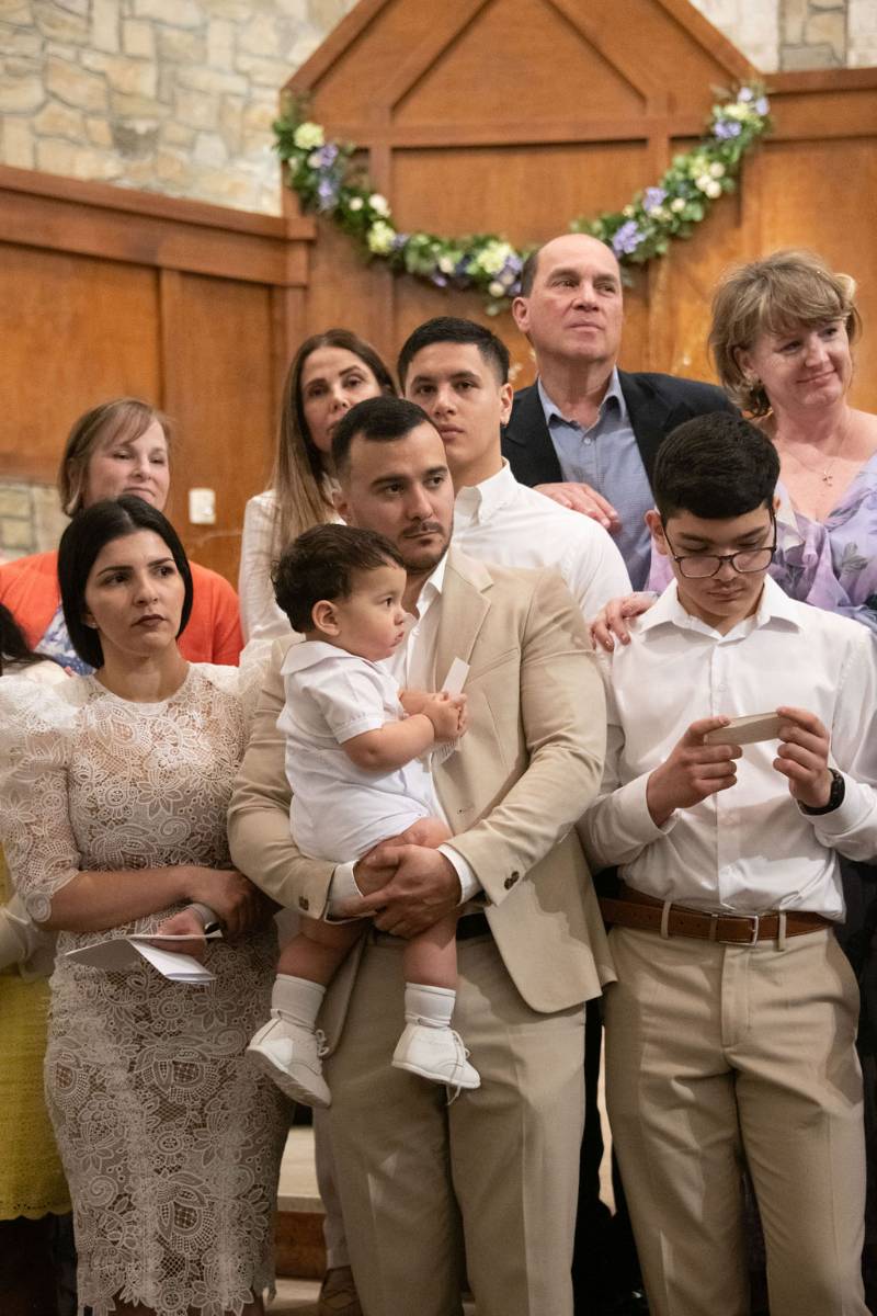 A family of four joins the Catholic Church at St. Pius X in Greensboro.