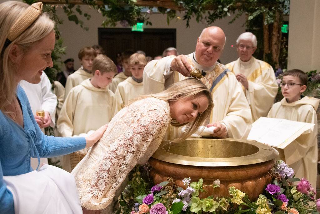 Forty-six men, women, teens and children joined the Catholic Church at St. Pius X Parish in Greensboro.