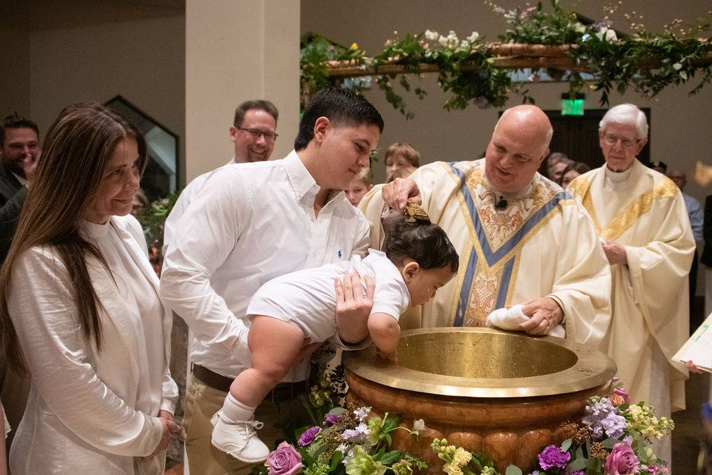 Forty-six men, women, teens and children joined the Catholic Church at St. Pius X Parish in Greensboro.