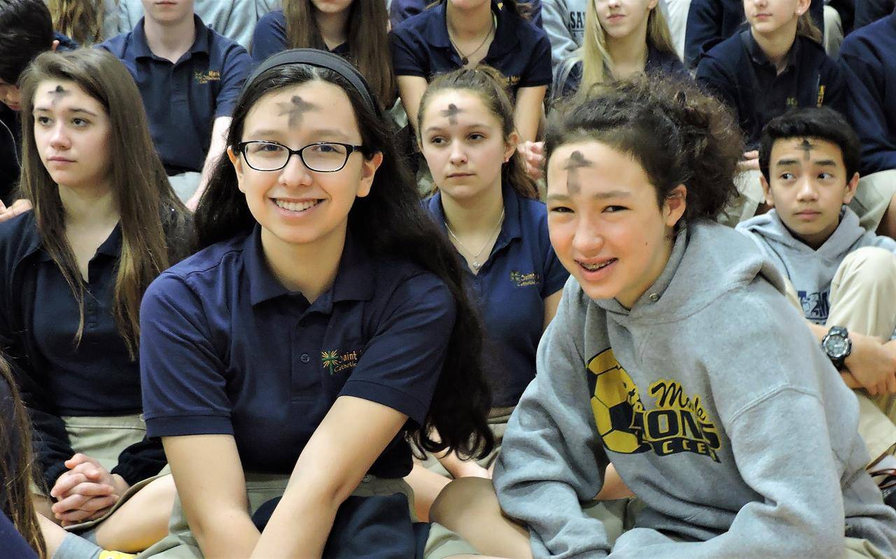 Students at St. Mark School receive ashes. 