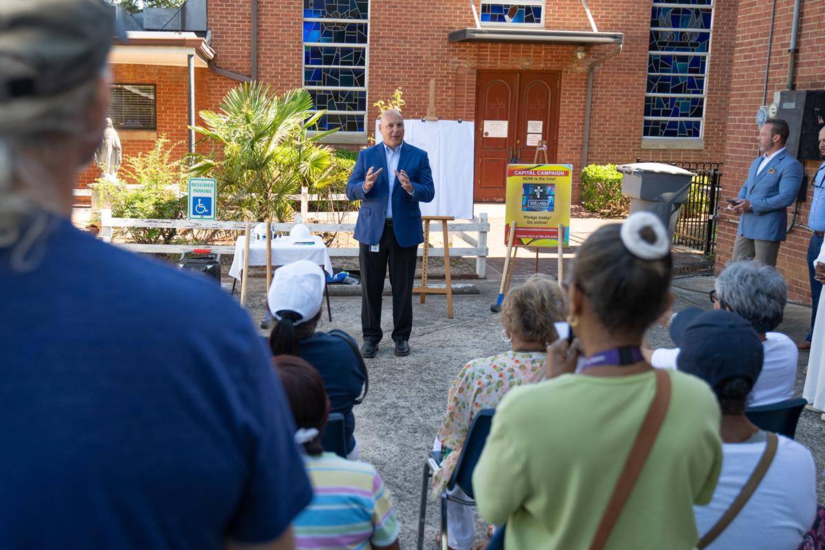 Diocese of Charlotte Properties Coordinator John Nobers talks to the crowd.