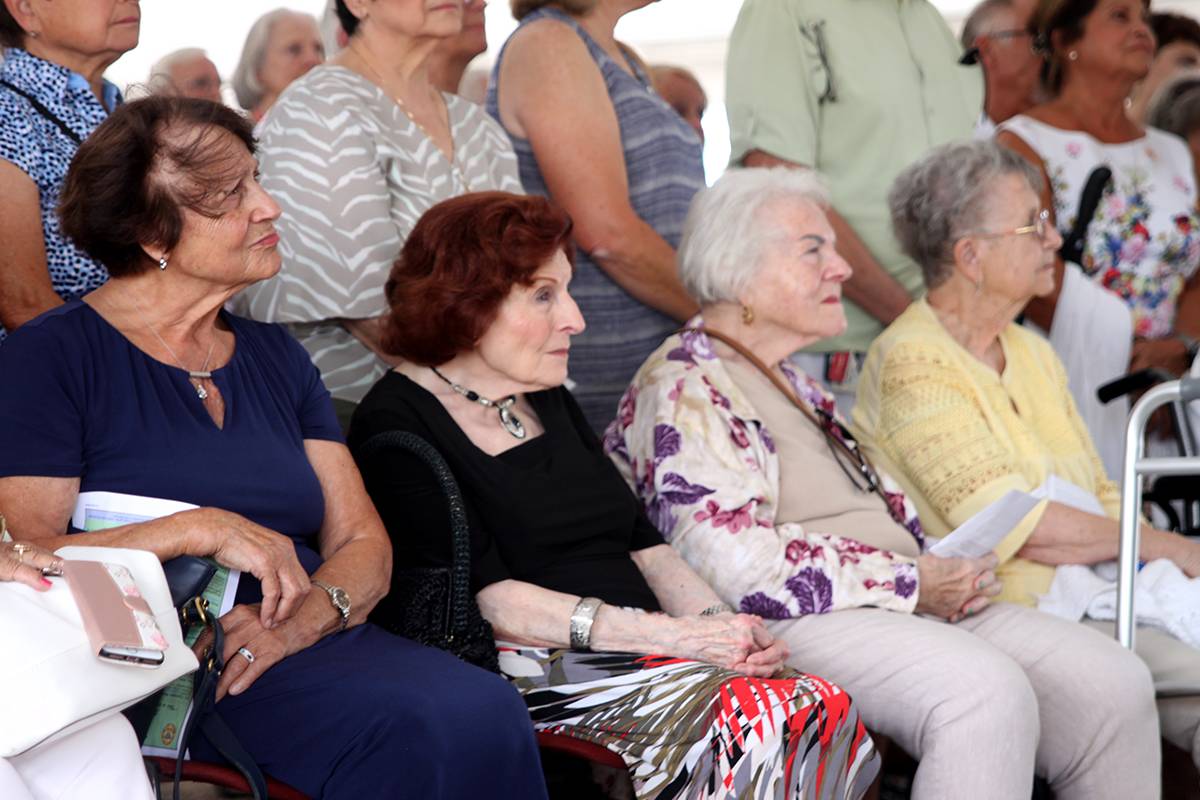 Father Malacari's mother (second from left) was a special guest at the groundbreaking ceremony.