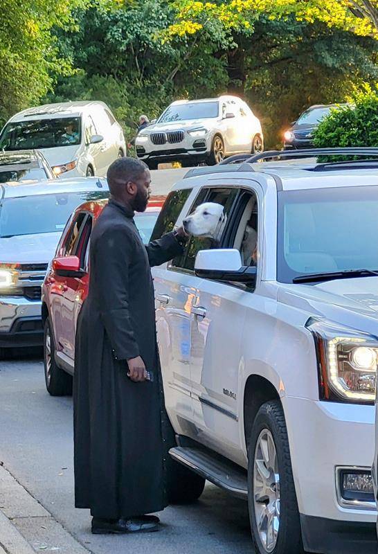 Students arrive for the first day at St. Mark School in Huntersville.