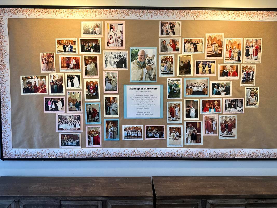 At St. Pius X School, a bulletin board full of photos featuring students with Monsignor Anthony Marcaccio provided a poignant tribute to their late pastor, who passed away July 19. The board also featured an inspirational quote from one of Monsignor Marca