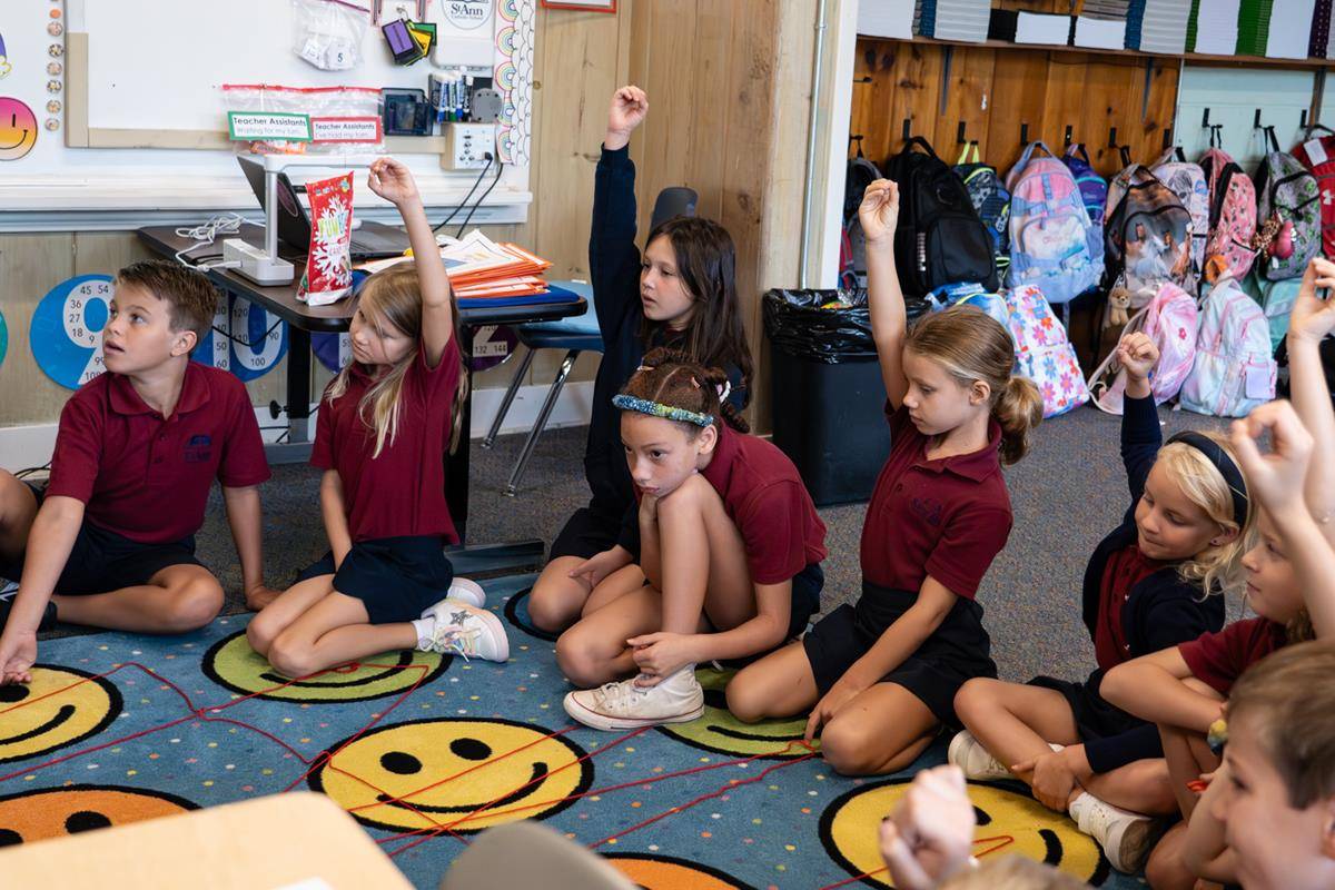 Students are excited for the first day of school at St. Ann in Charlotte.