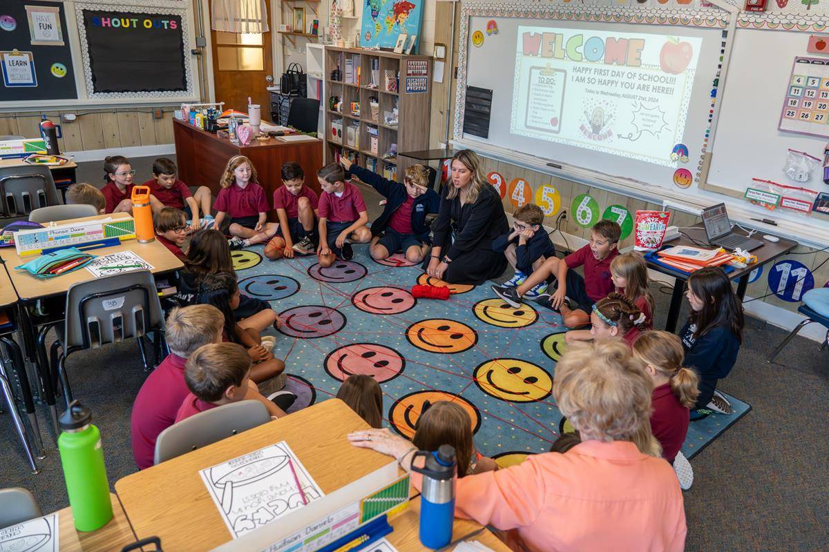 Students are excited for the first day of school at St. Ann in Charlotte.