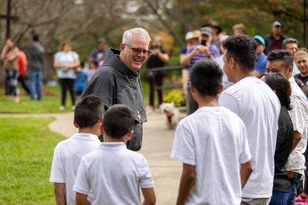  Bishop Martin was greeted by people the minute he pulled in to Swannanoa. (Gabriel Swinney)