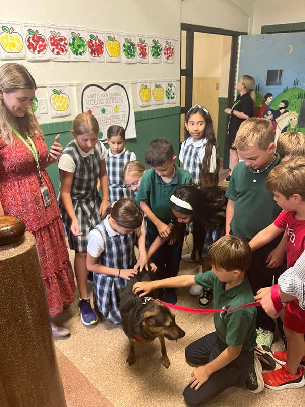 For the Feast of St. Francis of Assisi, St. Patrick School students and faculty welcomed a couple of four-legged special guests to their Charlotte school, Cassius and Fraiser.