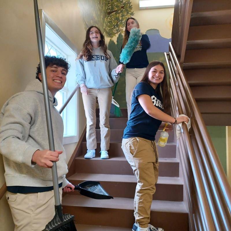 Bishop McGuinness High School student baked homemade cookies, cleaned around the house, chalked the walk, and made welcome cards for SECU Family House of Winston-Salem. 