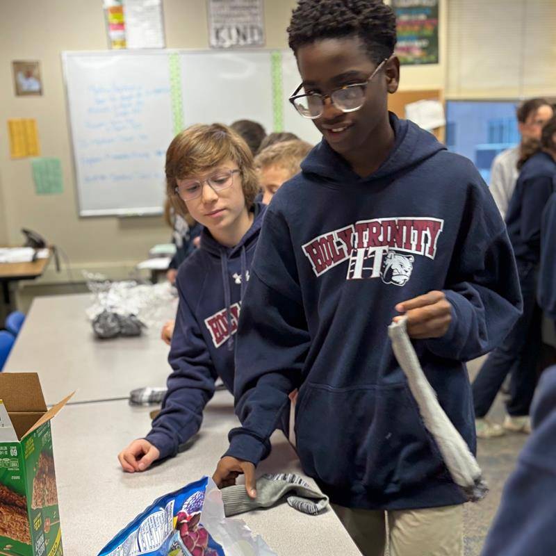 Celebrating Catholic School Week at Holy Trinity Middle School. Each grade performed a service project with the help of our generous PTO. Students supported Roof Above with giving socks, Bright Blessings with birthday bags and Boys and Girls Clubs of Char
