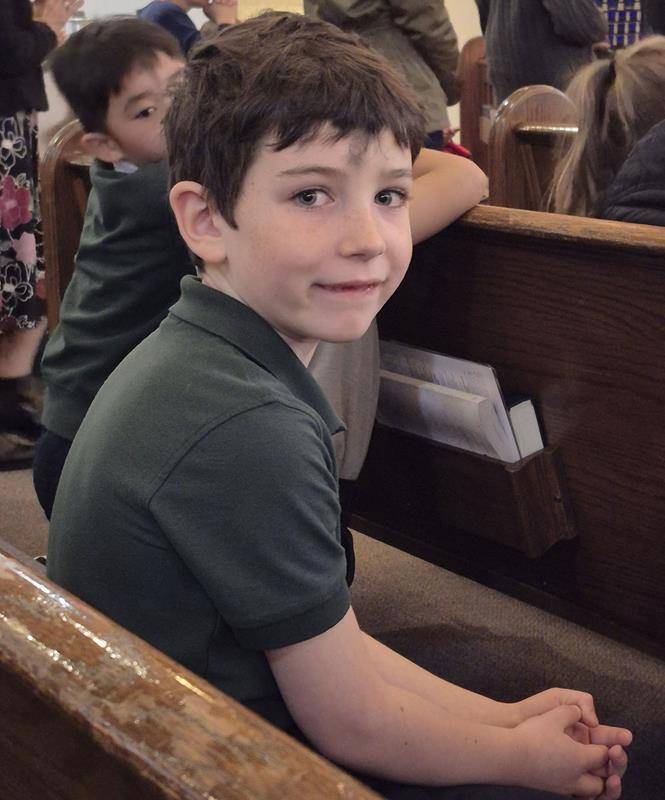 Students at St. Michael School in Gastonia receive ashes for the start of Lent. 