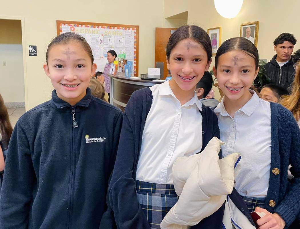 Some Immaculata Catholic School students and staff showed off their ashes following Mass. 
