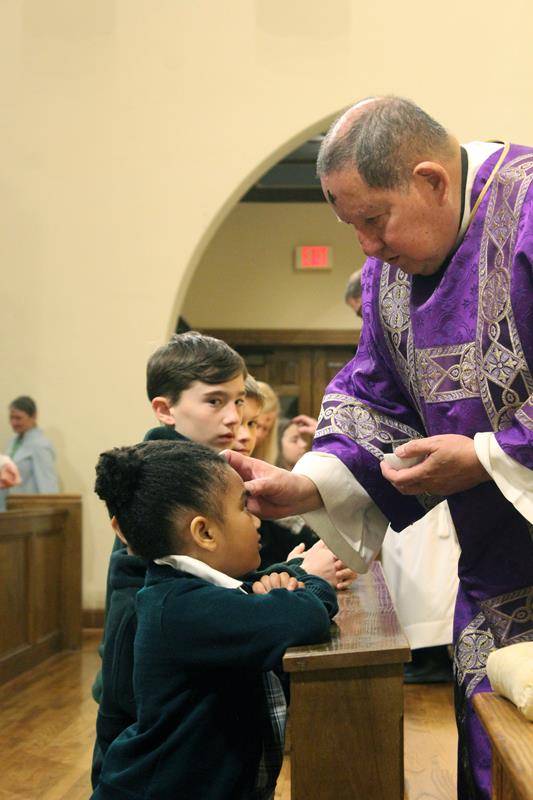 Students at St. Patrick School in Charlotte mark the start of Lent with Ash Wednesday with a school Mass at St. Patrick Cathedral.
